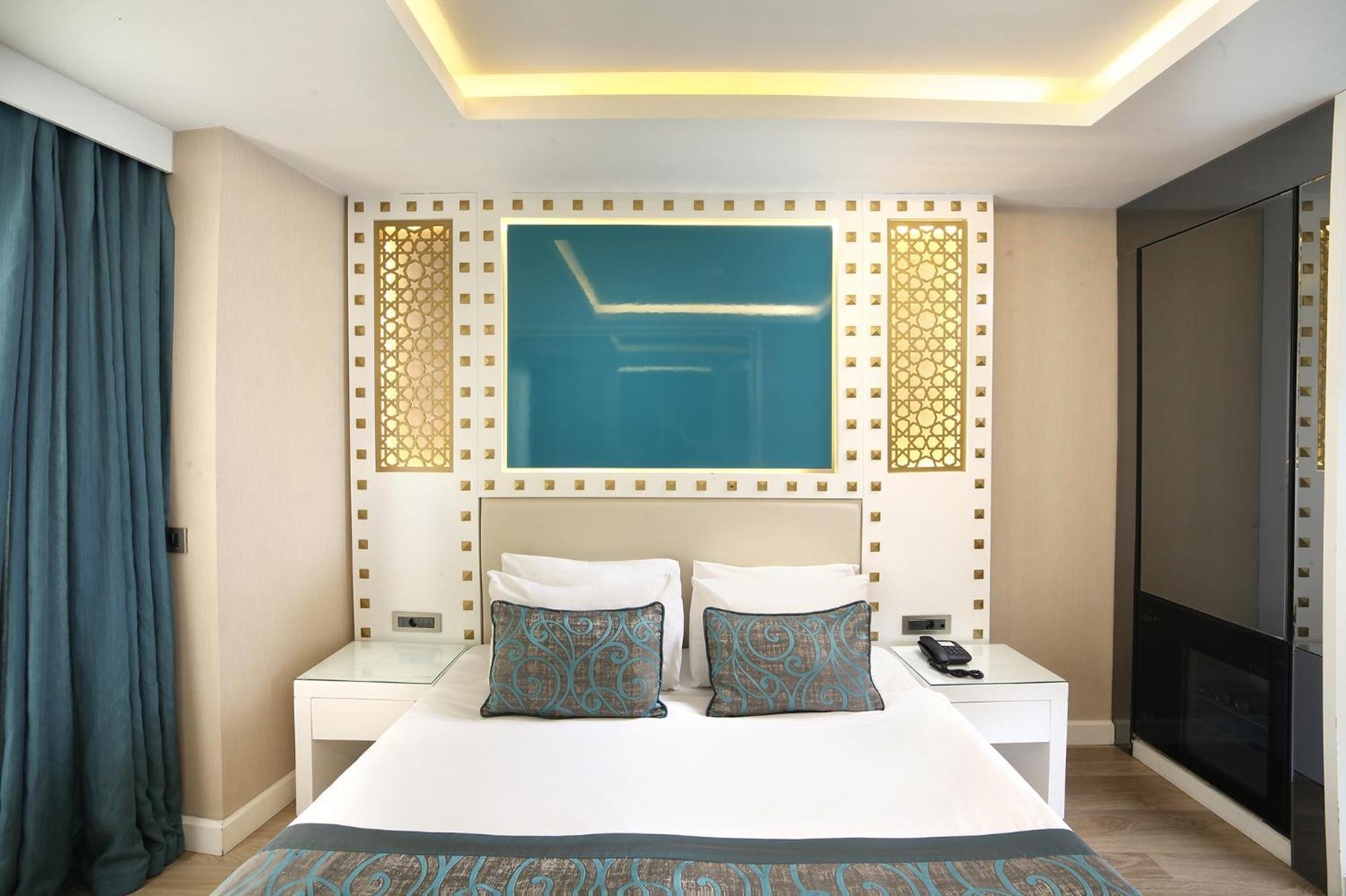 Great Fortune Hotel & Spa Isztambul Kültér fotó A bedroom at the hotel